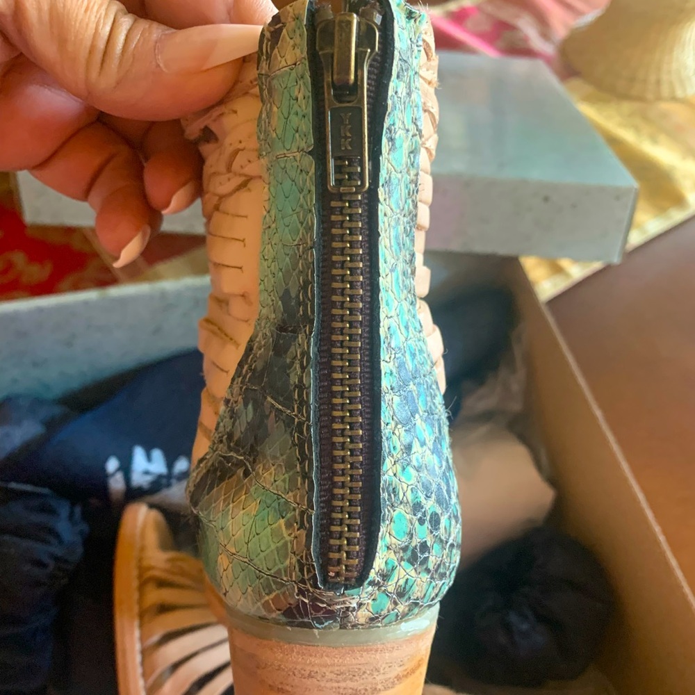 Beautiful new pair of shoes. I couldn’t fit into them because of my high arch.